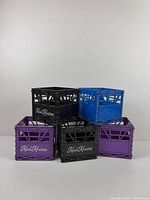 Five Kool Krates crates stacked, showing colors and logo