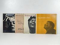 Front view of all four LP jackets side by side