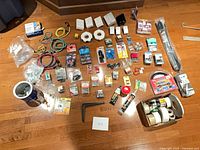 Full layout of all hardware, electrical adapters, tapes, fasteners and accessories