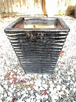 Full view of planter front showing ridged exterior