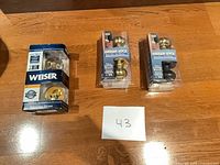 Front view showing Weiser deadbolt box and two Weiser privacy knob boxes