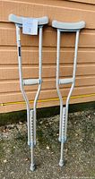 Full view of both crutches showing overall condition and size