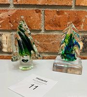 Both glass tree sculptures front view