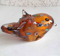 Left side view of amber millefiori glass hippo
