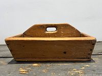 Overall view of antique pine toolbox front