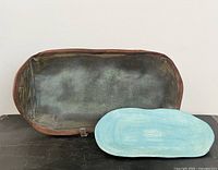 Large and small Cynthia Cupples pottery platters on display