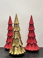 Front view of all three tiered Christmas tree figurines