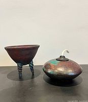Both raku pieces together: tripod bowl and oil diffuser
