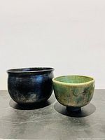 Both Raku vessels side by side