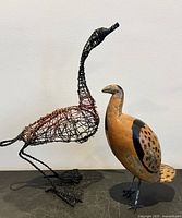 Wire duck and wooden emu full view