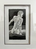 Close view of framed intaglio print showing full artwork, mat, and frame