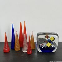 Group shot of aquarium paperweight and eight spiral cones