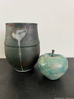 Vase and apple together showing size relation and finishes