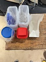 All seven containers grouped on table