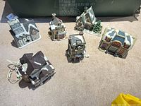 Group shot of all six Department 56 village buildings with cords visible