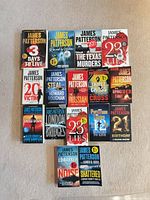 All 16 James Patterson paperback novels laid out on carpet