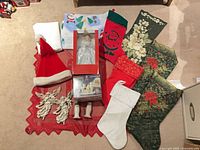 Group shot of all stockings, figurines, hat and textiles