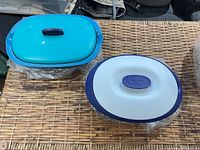 Rice and soup servers side by side, both wrapped