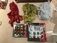 Overview of both ornament boxes and three tinsel garlands