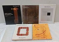 front covers of the five Bonhams catalogues