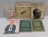 Front view of all six art reference books
