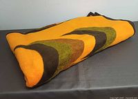 Folded vintage acrylic blanket showing texture and edge