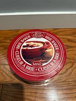 Box top showing Remy Olivier branding and product image