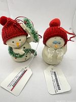 Both Snowpinions ornaments front view