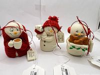 All three Enesco Snowbabies figurines side-by-side