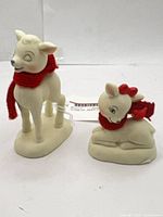 Both deer figurines together