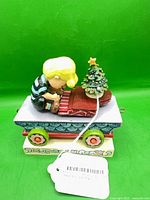 Front angled view showing full figurine with Schroeder, piano, Christmas tree and train car base