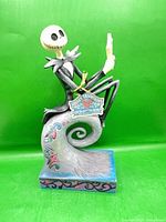 Front view of Jack Skellington figurine on spiral hill base