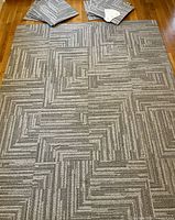 Sixteen FLOR tiles assembled on floor showing overall pattern