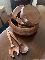 Set showing large bowl, stacked small bowls and tongs