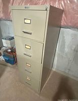 Front view of beige four-drawer filing cabinet