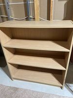 Front view of Ikea Billy bookcase showing shelves