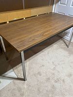 Full view of table showing top surface and legs