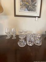 All twelve crystal pieces grouped on tabletop