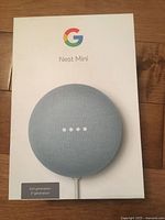 Front of retail box showing Google Nest Mini 2nd Generation image