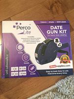 Front of sealed Perco Lite Date Gun Kit box showing contents and quantity