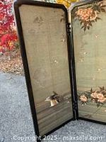 full view of two joined panels showing blossoms and ducks