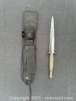Knife and sheath side by side