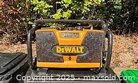 Front view showing DeWALT logo, speakers and overall condition