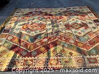 Full view of kilim rug laid flat showing overall pattern and size