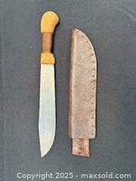 Machete and sheath side by side
