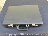 Closed black briefcase exterior