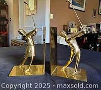 Front view of both brass golfer bookends