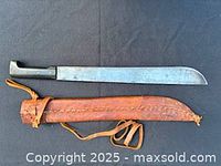 Machete and scabbard full view