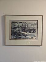 Full view of framed print on wall
