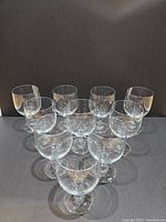 All twelve stemmed goblets arranged in rows